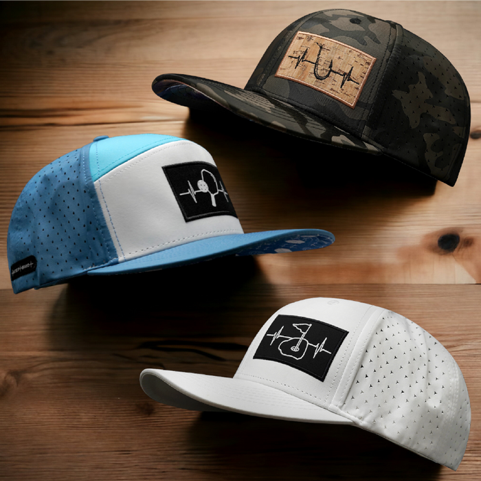 Image showcasing three hats by The Heartbeat Brand, emphasizing heart health and wellness